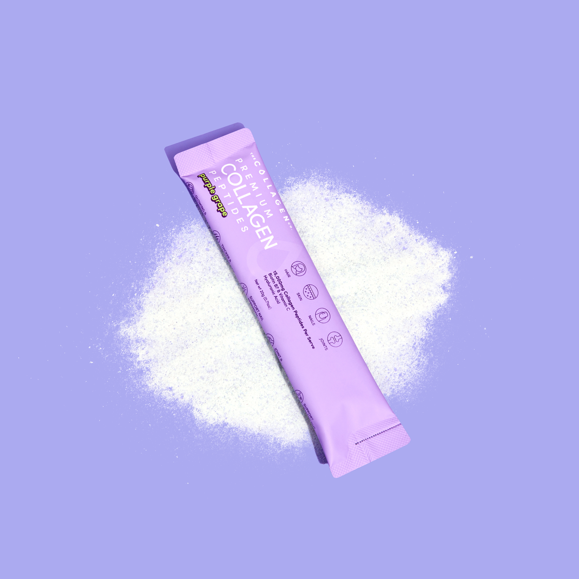 Purple collagen sachet packet on purple background with white powder splash effect