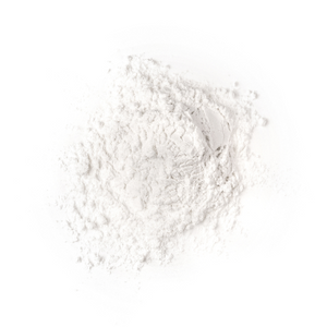 White collagen powder pile on a plain background, showcasing its fine texture for beauty and wellness supplements.