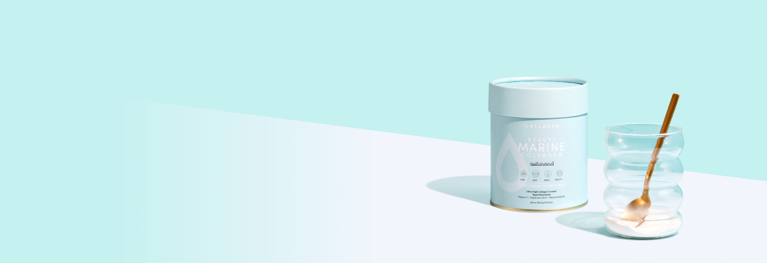 Marine collagen powder container and a stylish glass with a gold spoon against a light blue background.