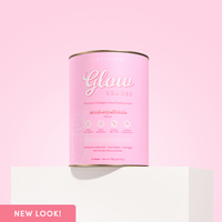 A bright pink canister of Glow Shakes strawberry milkshake collagen meal replacement displayed on a white pedestal against a pink background. The label highlights key benefits such as weight management and glowing skin.