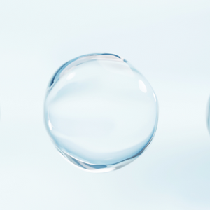 Close-up of a smooth, glossy clear droplet against a light background, symbolizing purity and hydration, often linked to beauty supplements.