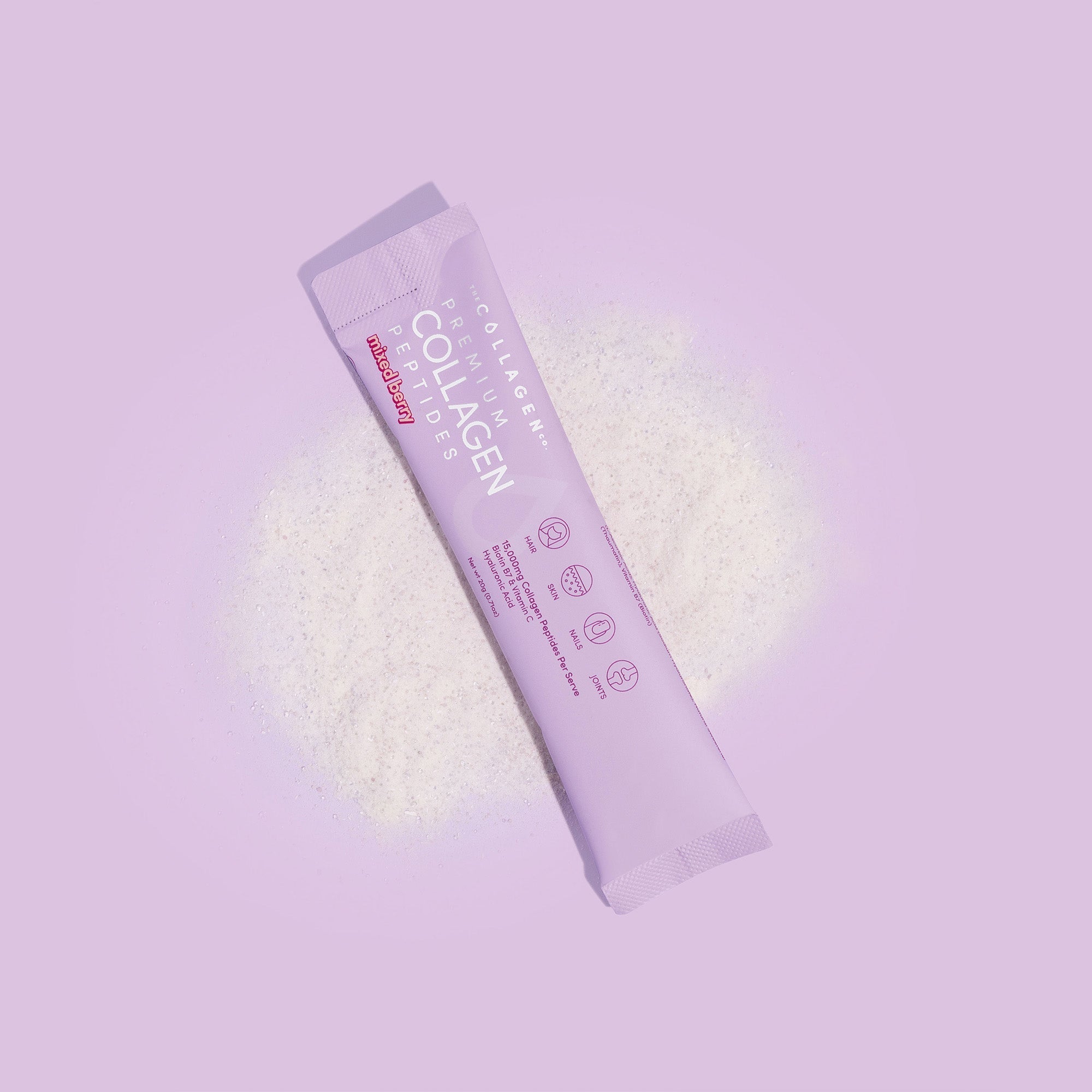 Mixed Flavours Collagen Sachet on purple background with powder spread, showing single purple packet of collagen supplement
