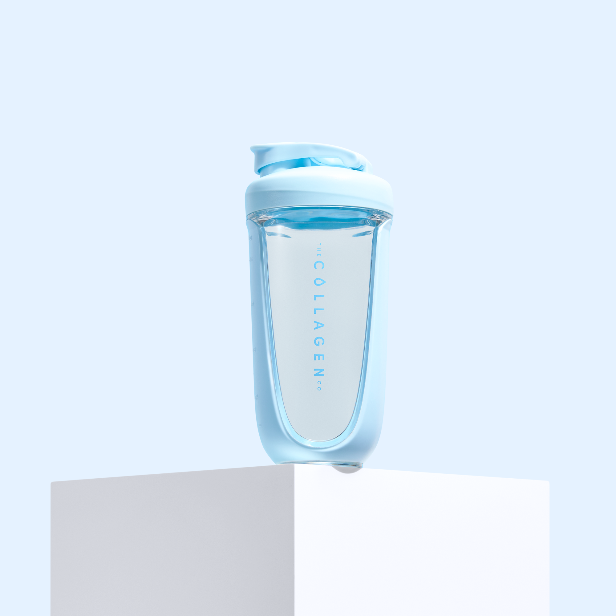 Plastic shaker from The Collagen Co with blue accents.