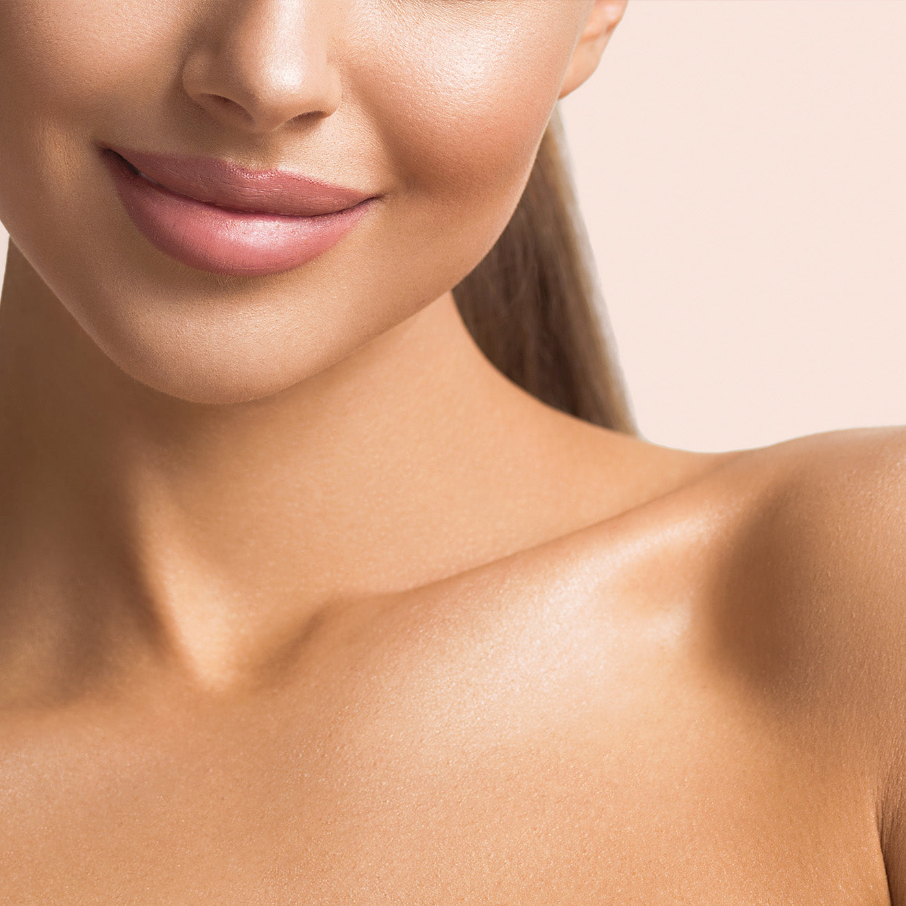 Smiling woman with radiant skin and smooth complexion, highlighting beauty and skincare benefits of collagen supplements.