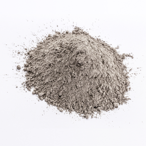 A heap of fine, gray collagen powder on a white background, emphasizing beauty and supplement use.