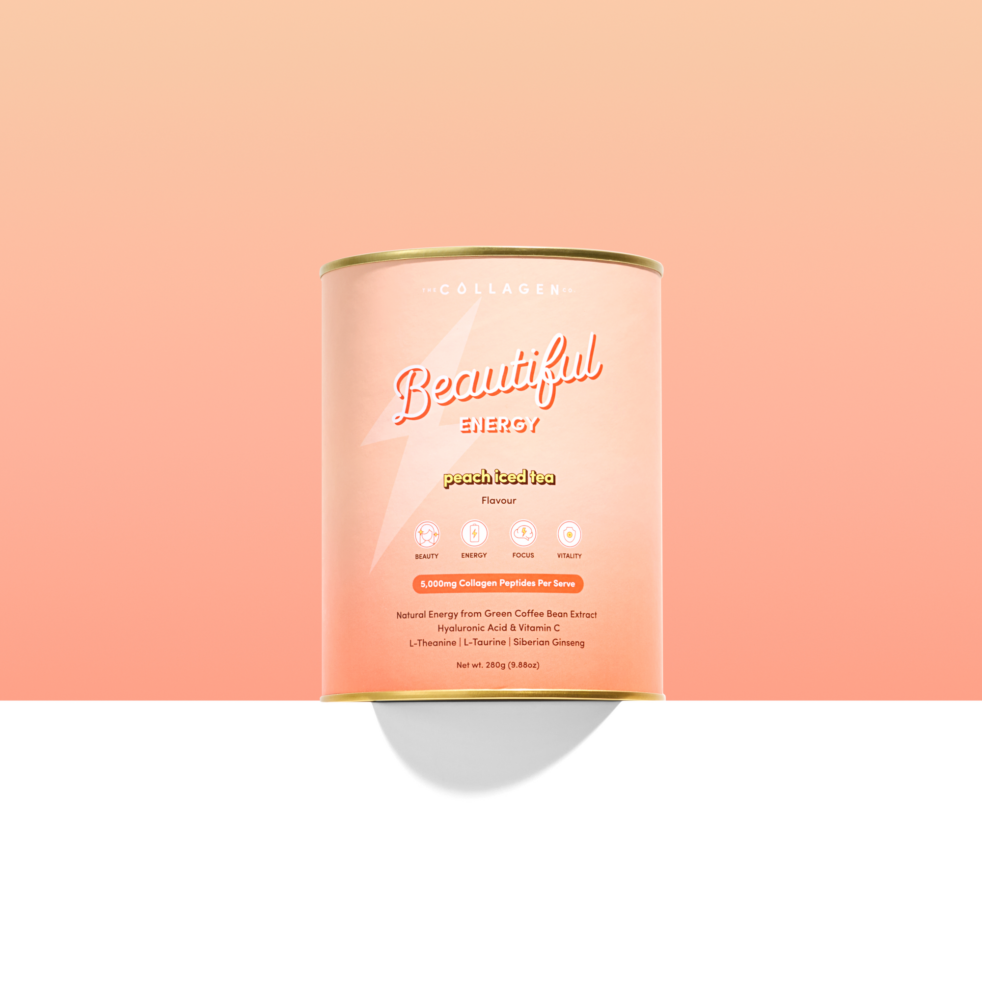 Canister of 'Beautiful Energy' peach iced tea on a peach background