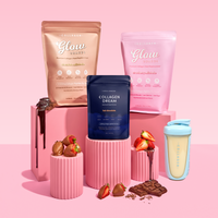 Collagen supplements display on pink background with strawberries, chocolate, and a shaker bottle. Vibrant packaging promotes skin and beauty benefits.