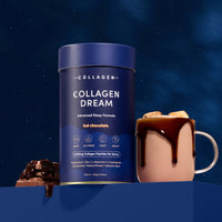 A container of The Collagen Co. Collagen Dream Advanced Sleep Formula Hot Chocolate (420g) sits beside a mug topped with marshmallows and chocolate, set against a starry night sky—perfect for radiant skin health.