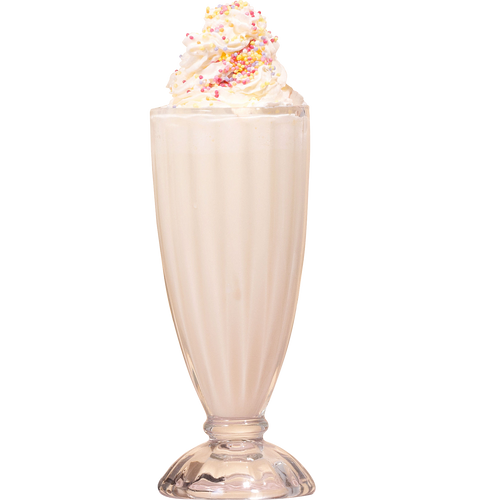 A creamy milkshake in a tall glass with whipped cream and colorful sprinkles on top.