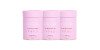 Three pink collagen supplement containers with "Beauty Glow" label, side by side, enhancing skin health and wellness.