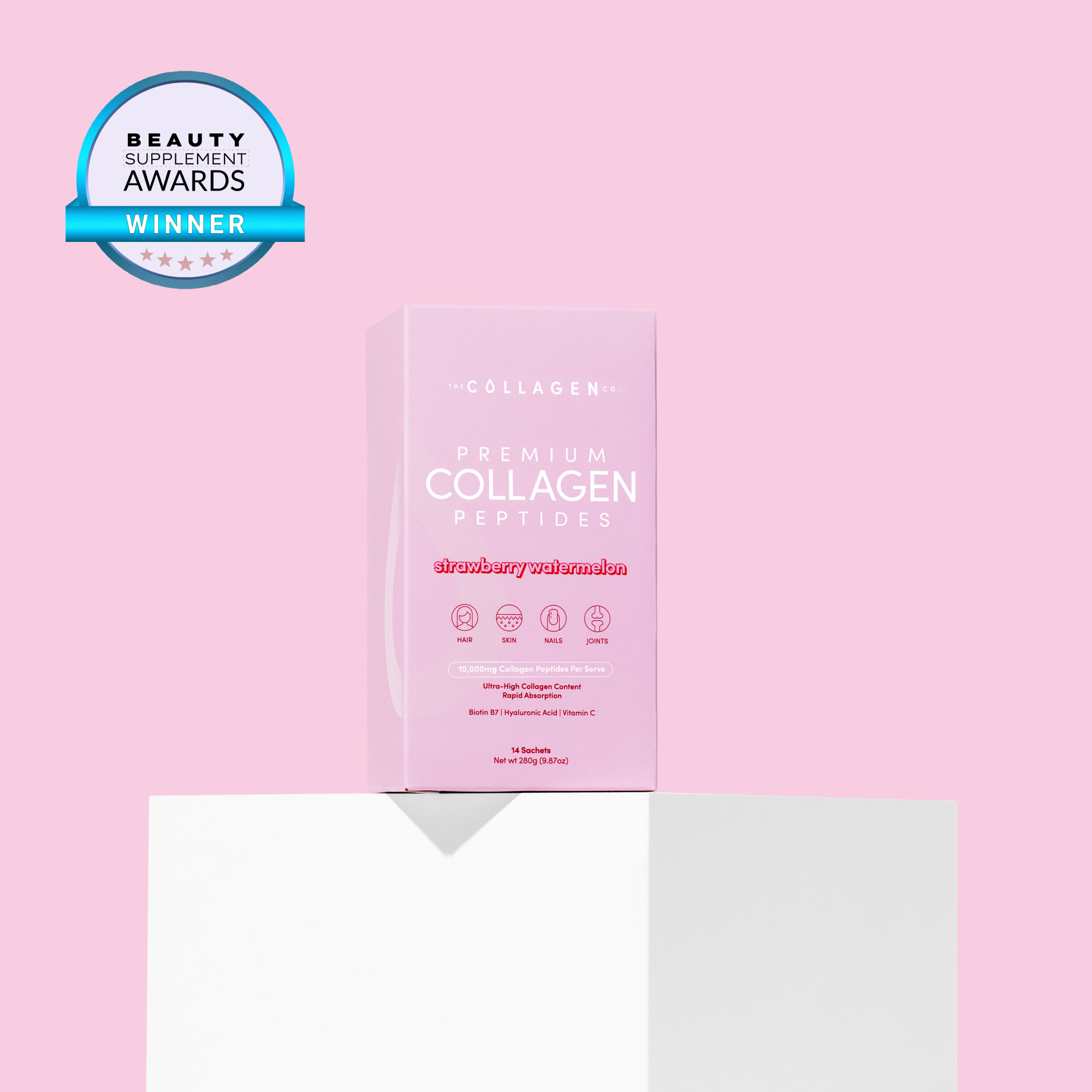 Pink box of premium collagen peptides on a white pedestal with a Beauty Supplement Awards winner badge, set against a pink background.