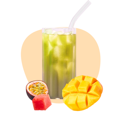 A tall glass of green iced drink with a clear straw, surrounded by a cut mango, a halved passion fruit, and a piece of watermelon, all set against a light background with a peach-colored abstract shape.