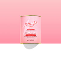 A cylindrical pink container of The Collagen Co USA's Raspberry Crush Beautiful Energy - 280g sits against a gradient pink background, featuring white and gold text highlighting clean energy for focus and clarity.