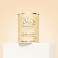 A beige canister of The Collagen Co. Vanilla Milkshake Collagen Meal Replacement (756g) sits atop a white pedestal, highlighting its hydrolysed collagen peptides for protein and weight management support.
