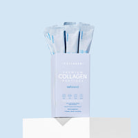 Box of premium collagen peptides with multiple packets on a light blue background