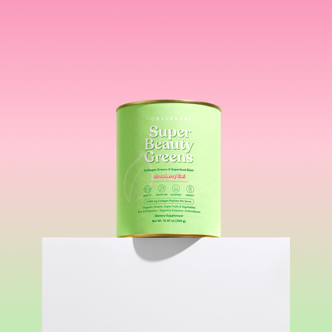 Green canister labeled 'Super Beauty Greens' on a gradient pink to white background